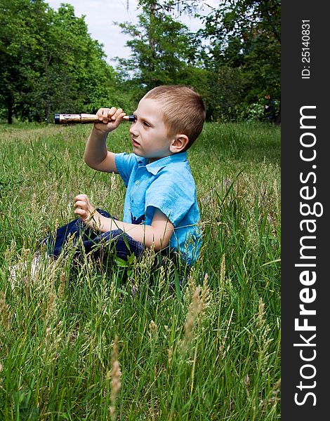 Boy plays on the nature