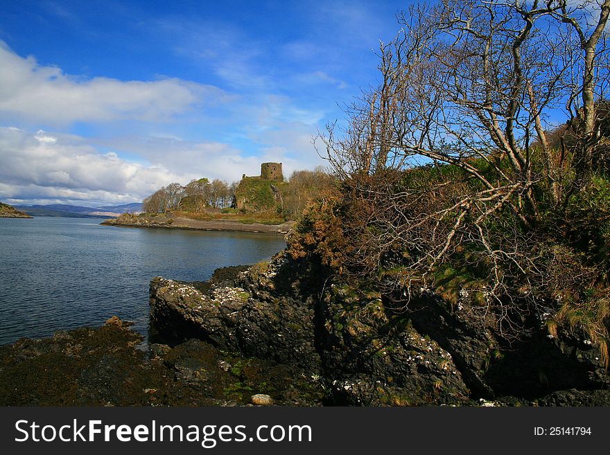 A Spring afternoon in Oban, Western Scotland. Looking towards Dunollie Castle north along the Sound of Kerrera. A Spring afternoon in Oban, Western Scotland. Looking towards Dunollie Castle north along the Sound of Kerrera.