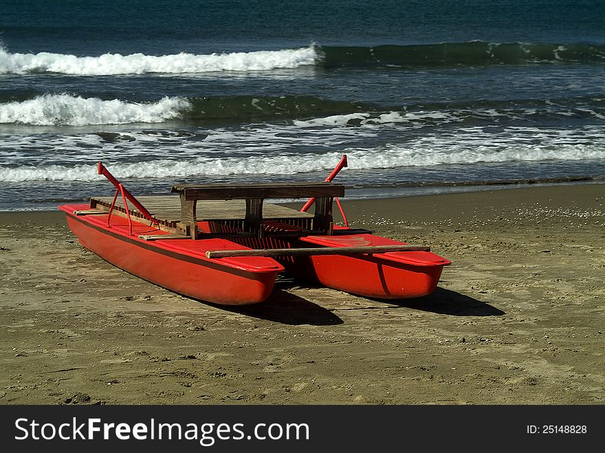 Red paddle boats on the beach. Red paddle boats on the beach