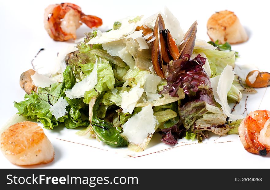 Unusual salad with lettuce, seafood