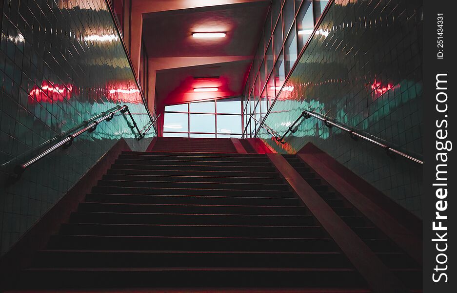 Urban Colored Building, Art, Modern Steps Lead Up The Stairs To The Building Window. Steps In A Building With Turquoise Walls And