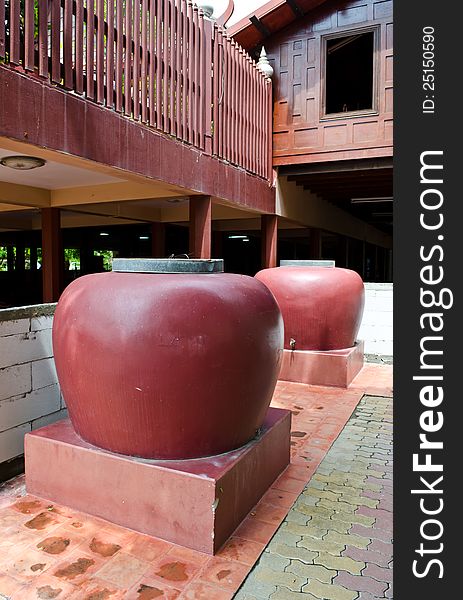 Big jars in an old Thai style house. Big jars in an old Thai style house