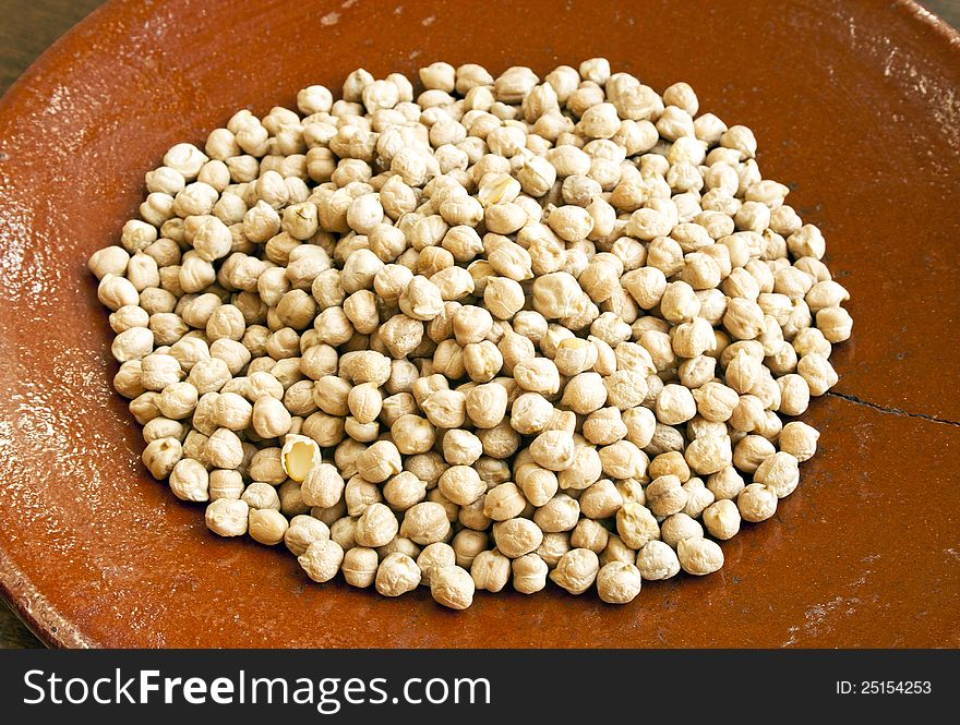 Chickpeas in old ceramic plate