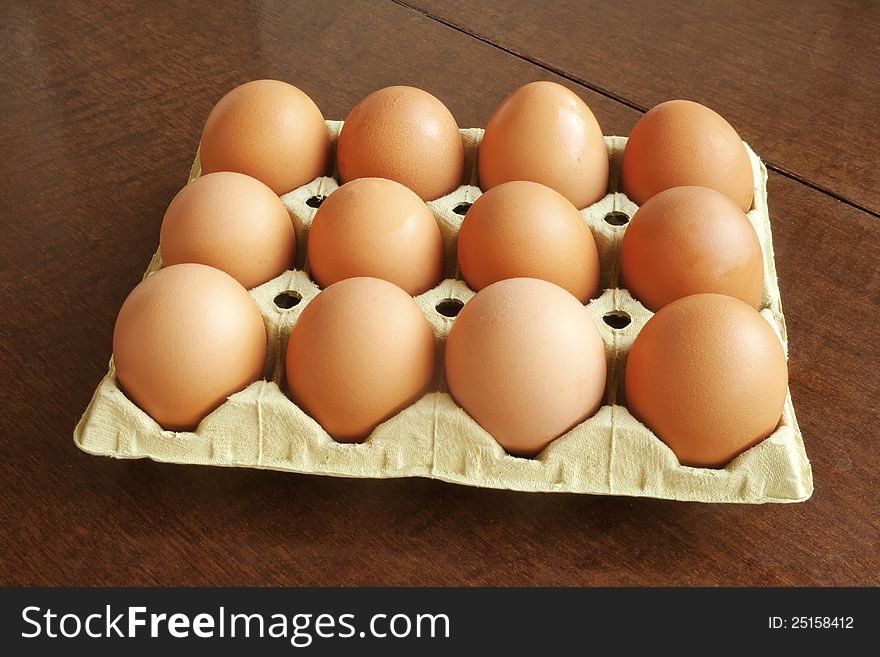 Dozen fresh brown hen eggs. Dozen fresh brown hen eggs
