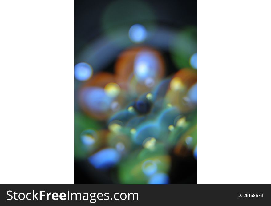 This is an image using a LED ring light at a different angle shooting into the first element of a lens to give the illusion of floating bubbles. This is an image using a LED ring light at a different angle shooting into the first element of a lens to give the illusion of floating bubbles.