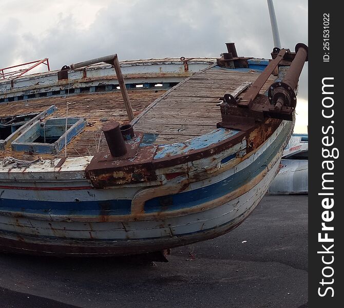 boat of migration in the port of pozzallo sicilia