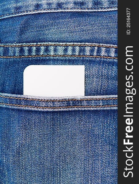 Blank white card peeking out of a rear denim jeans pocket ready for your message or text. Blank white card peeking out of a rear denim jeans pocket ready for your message or text