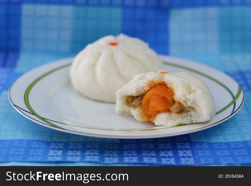 Chinese steamed stuff bun made from pork and salty egg