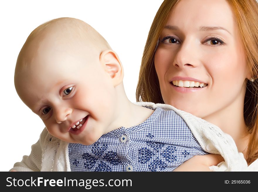 Portrait of happy mother with baby in her arms. Portrait of happy mother with baby in her arms.