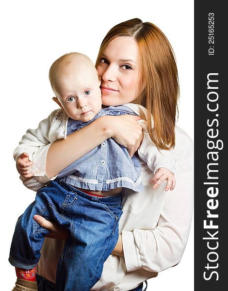 Portrait of happy mother with baby in her arms. Portrait of happy mother with baby in her arms.