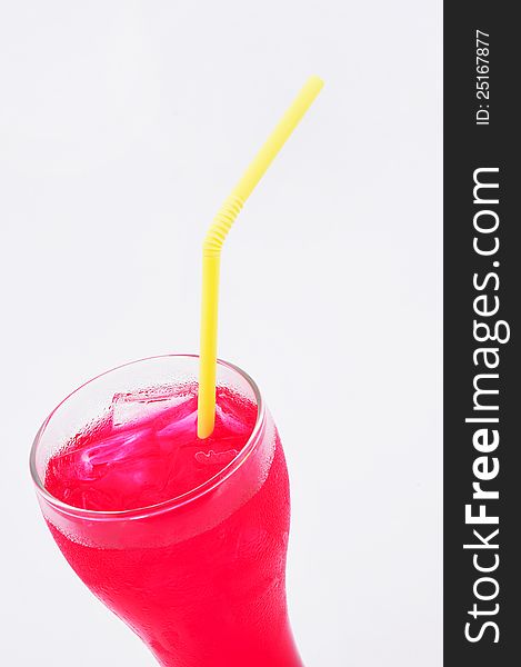 A glass of beverage , white background