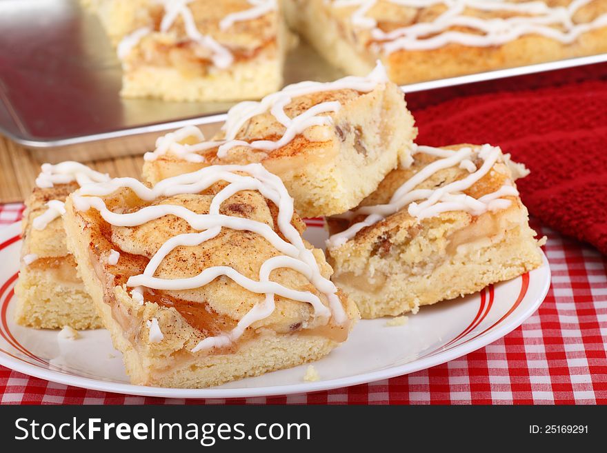 Stack of apple cake bars on a plate. Stack of apple cake bars on a plate