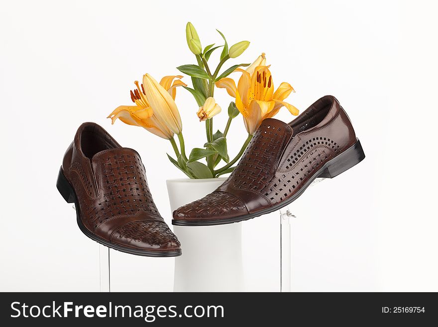 Men shoes with rose on white background