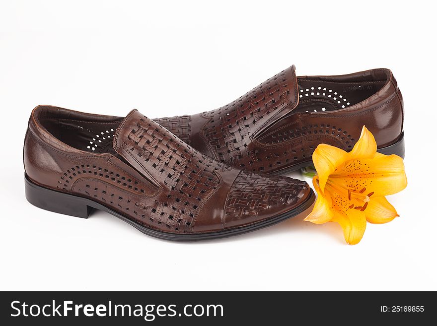 Men shoes with flower on white background