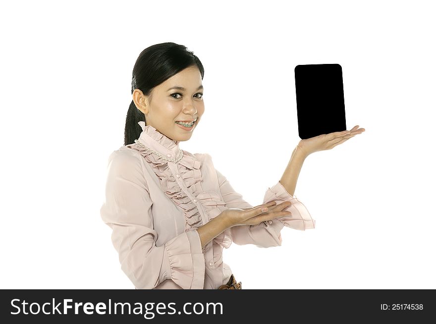 Young asian woman hold touchscreen computer. You can put your message on the pad. Young asian woman hold touchscreen computer. You can put your message on the pad