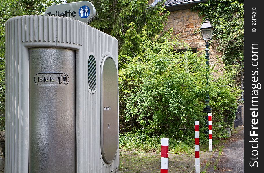 Modern automatic self cleaning, pay for use public toilet in the Park. Modern automatic self cleaning, pay for use public toilet in the Park