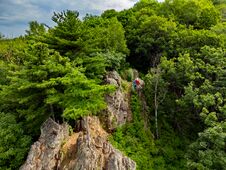 Rocky Hill With Abundant Vegetation. Cedars Grow Right In The Rocky Rock. Nature Protection Zone Near Khabarovsk In The Khekhtsir Stock Image