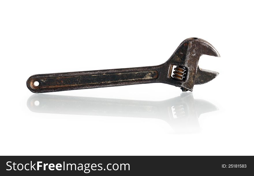 Old rusty adjustable wrench on white background. Clipping path is included. Old rusty adjustable wrench on white background. Clipping path is included