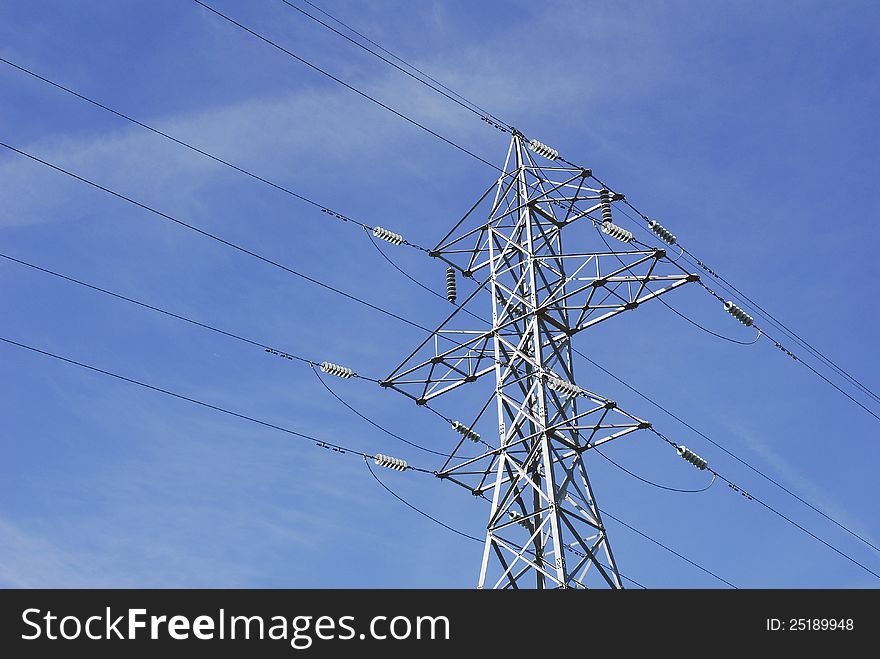 Electrical wires on a high tension tower. Electrical wires on a high tension tower