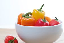 Colorful Mini Sweet Peppers In A White Bowl Stock Photos