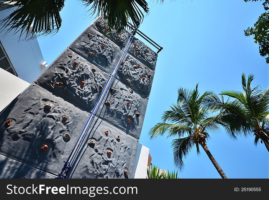 Artificial rock climbing wall in outdoor park