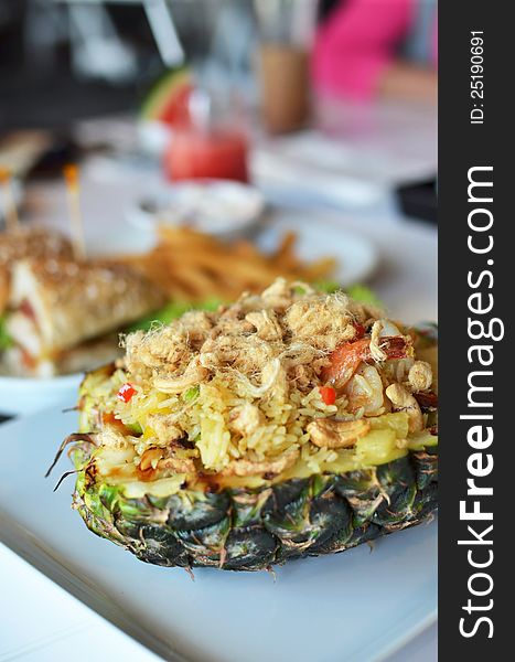 Fried rice with variety of ingredients in pineapple , tropical asian style food. Fried rice with variety of ingredients in pineapple , tropical asian style food