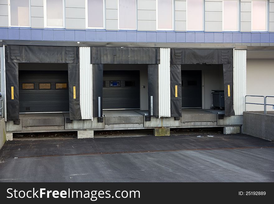 Picture of three loading docks used for trucks to unload goods