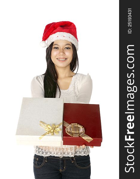 Woman wearing santa hat hold gift box isolated over white background. Woman wearing santa hat hold gift box isolated over white background