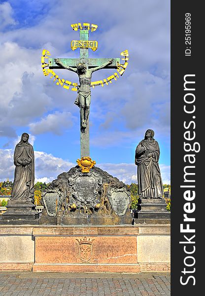 Cross statue on Charles bridge , Prague. Cross statue on Charles bridge , Prague