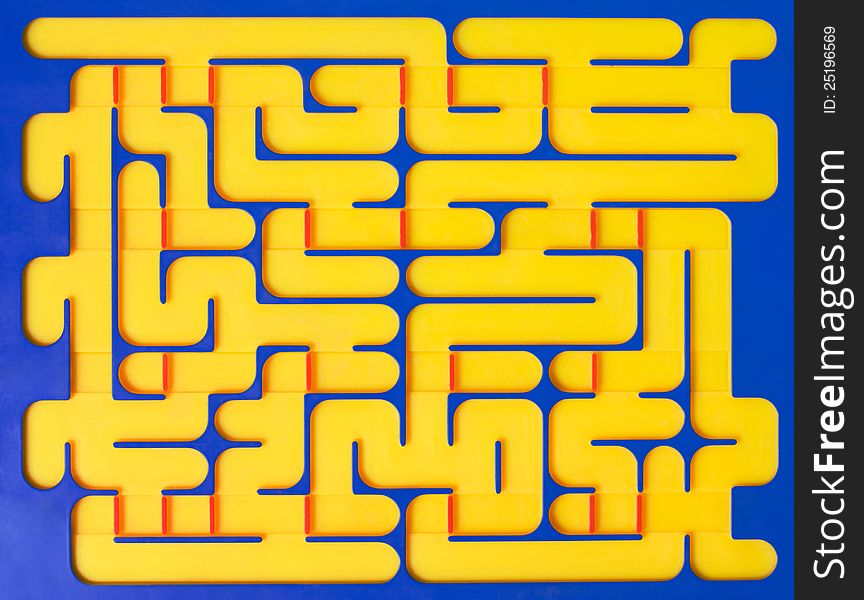 Maze toy, plastic yellow on blue labyrinth