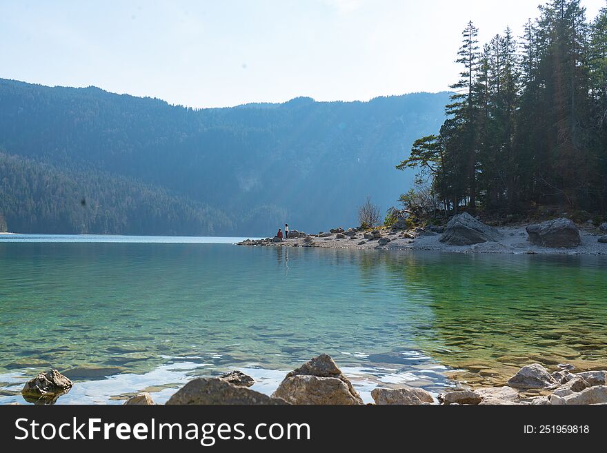 A Lake In The Mountains Of Bavaria Where You Can Relax