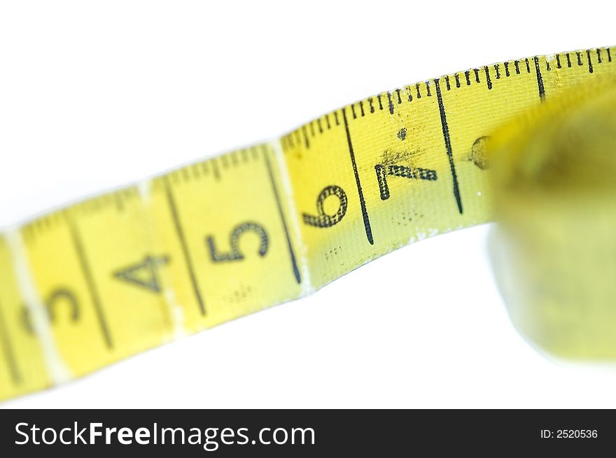 A yellow centimeter measure on white background