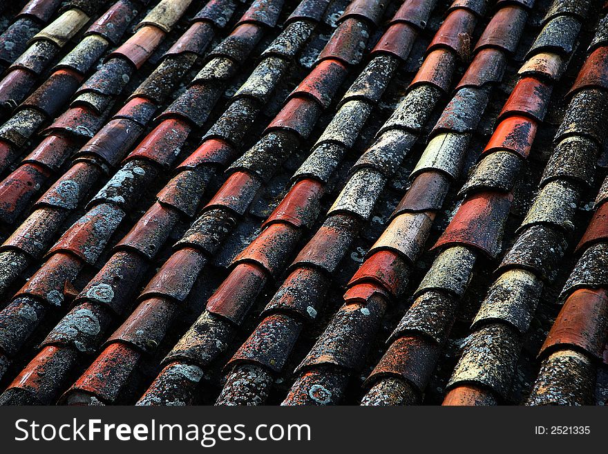 Spanish rural old terracota roof with lichens. Spanish rural old terracota roof with lichens