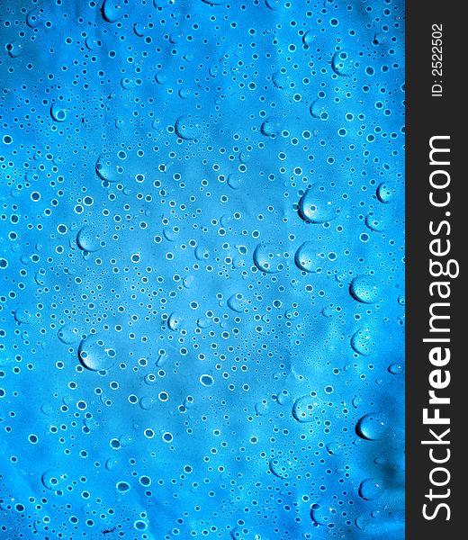 dripped water on turn blue background. dripped water on turn blue background