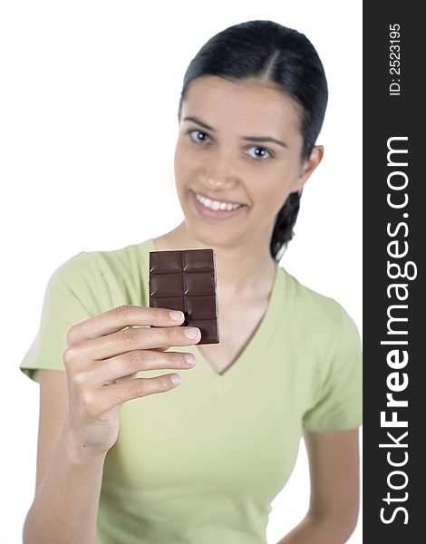 Pretty girl eating chocolate isolated. Pretty girl eating chocolate isolated
