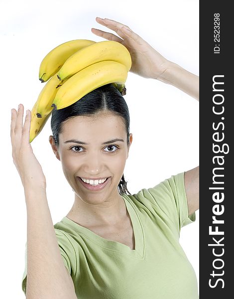 Girl holding bananas in her hand. Girl holding bananas in her hand