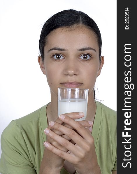 Girl holding glass with milk. Girl holding glass with milk