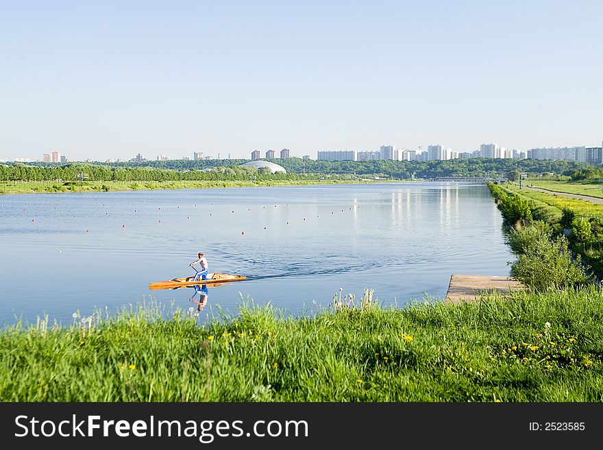 Lonely canoe on a rowing canal in Moscow. Lonely canoe on a rowing canal in Moscow