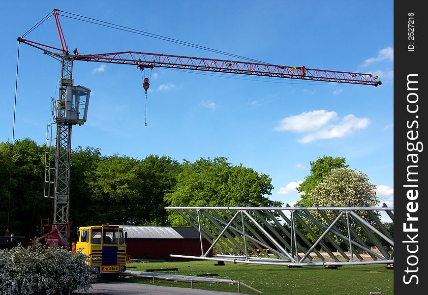 Portrait of old mobile crane at construction site