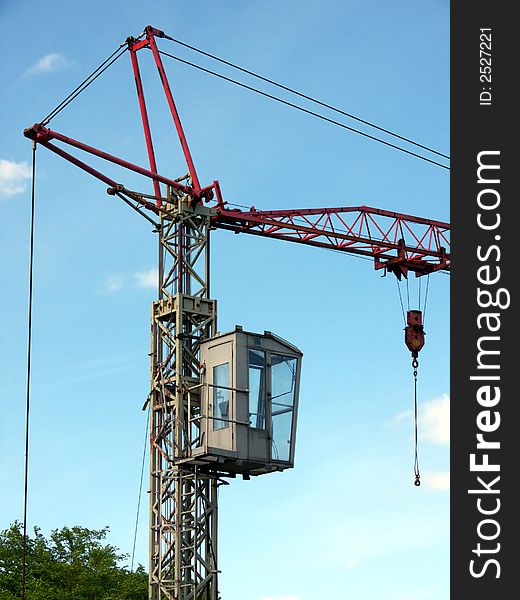 Portrait of old mobile crane at construction site