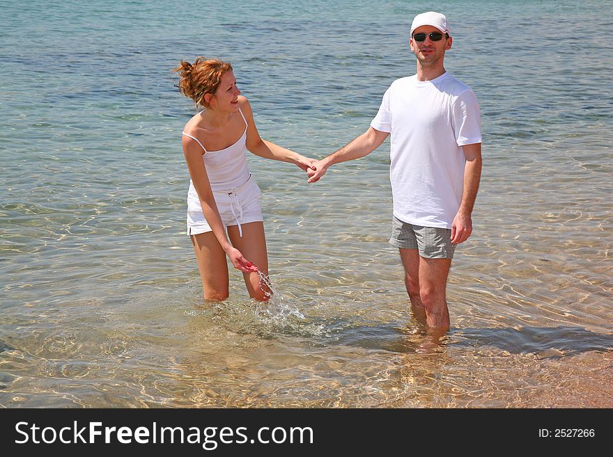 Couple man and women in water