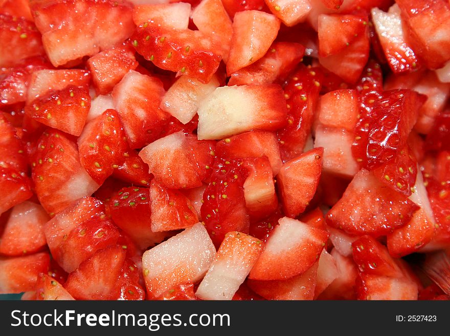 Several cut strawberries for background