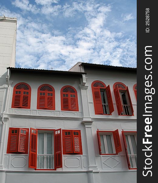 A building full of red traditional chinese window. A building full of red traditional chinese window