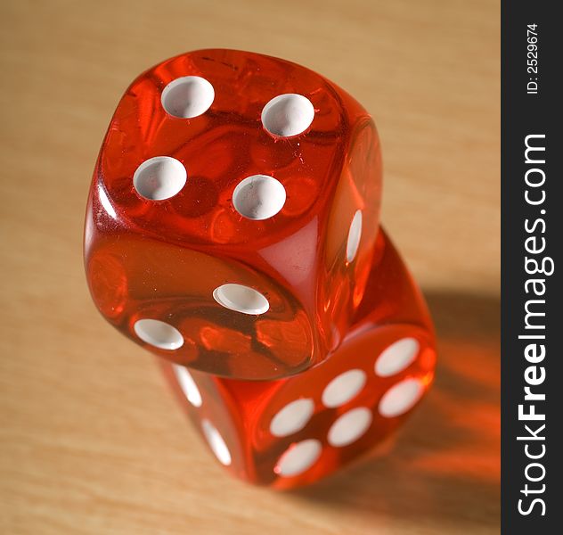 Red Dice on top of eachother isolated