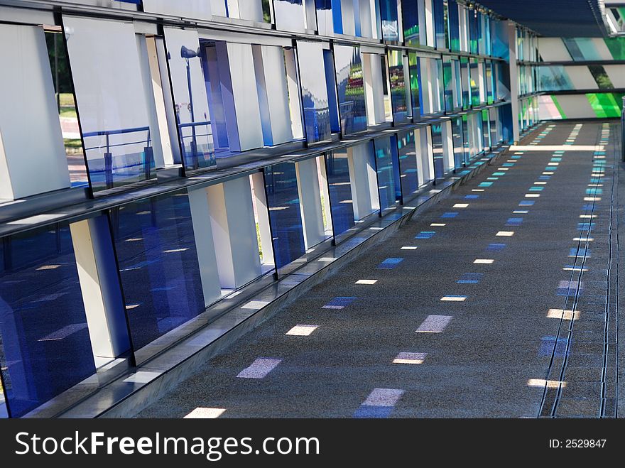 Colorful tinted glass walk way in the parks