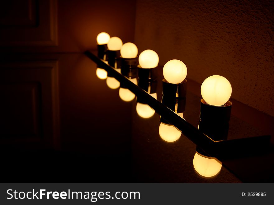 Six Light bulbs with a red background. Six Light bulbs with a red background