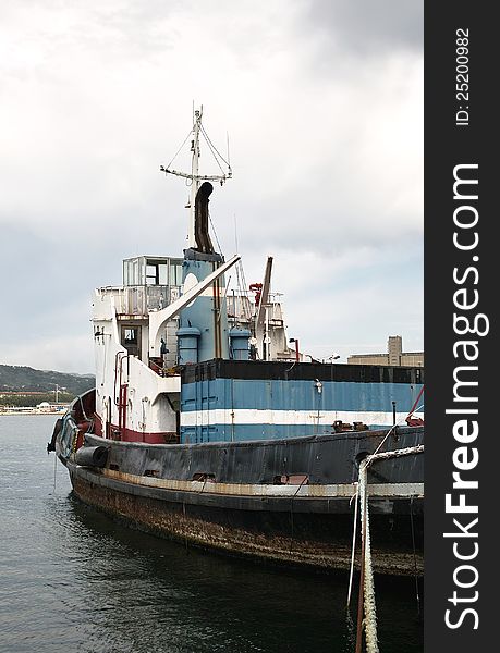 Detail of moored tugboat in the port