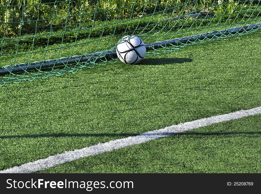 Football in the goal net