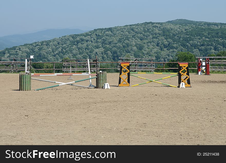 Numbered obstacle on sunny hippodrome