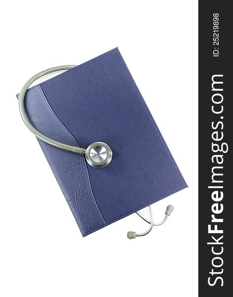 Stethoscope and book isolated on white background. Stethoscope and book isolated on white background